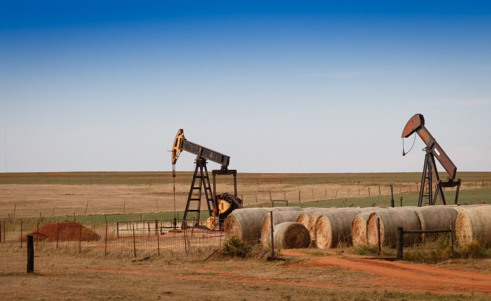 A,Scene,From,Rural,Oklahoma.,Oil,Pumps,And,Hay,Bales